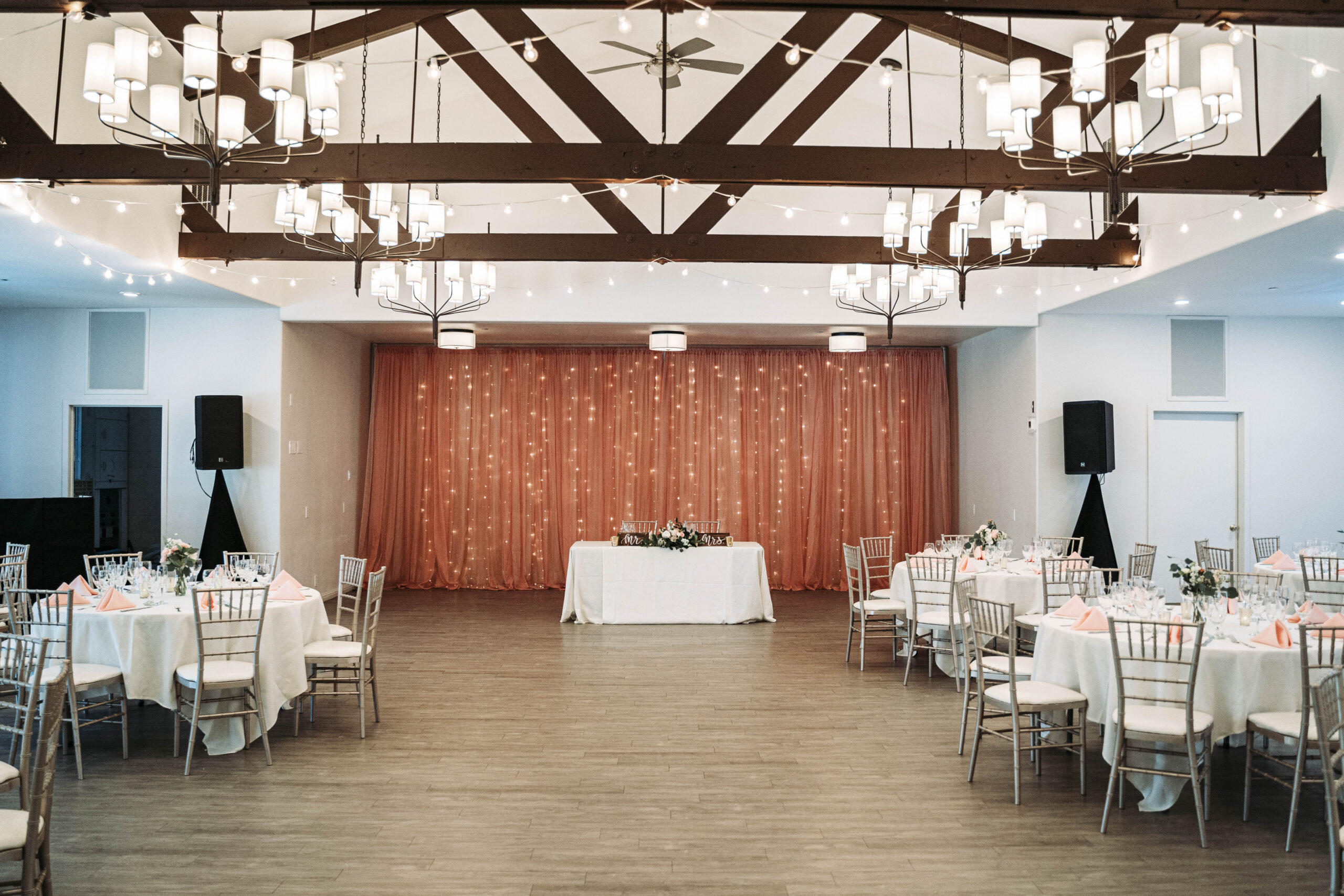 A beautifully decorated venue interior for a wedding